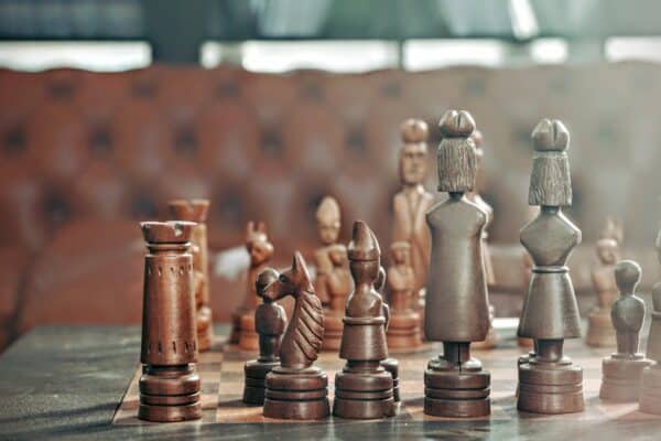 Wood sculpted chess pieces
