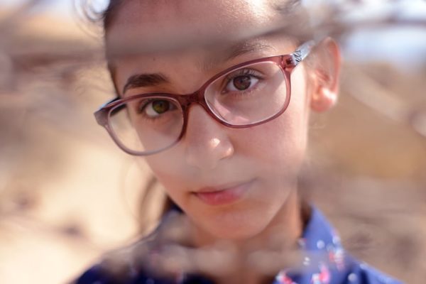 Young girl wearing glasses