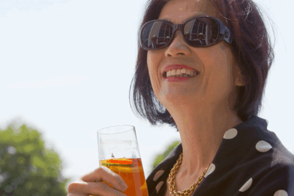 Woman smiling at Mitsubishi annual event