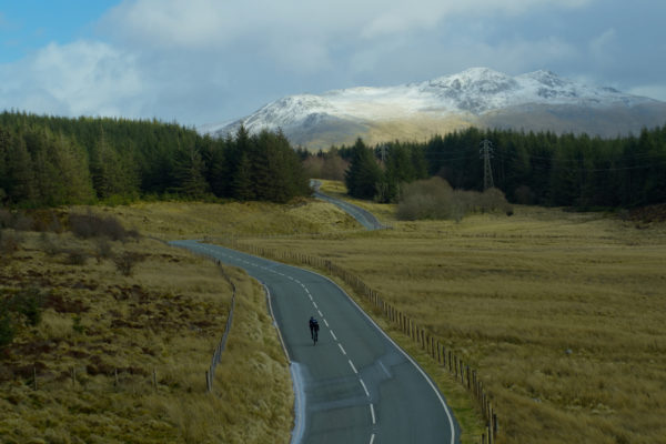 empty road man cycling alone