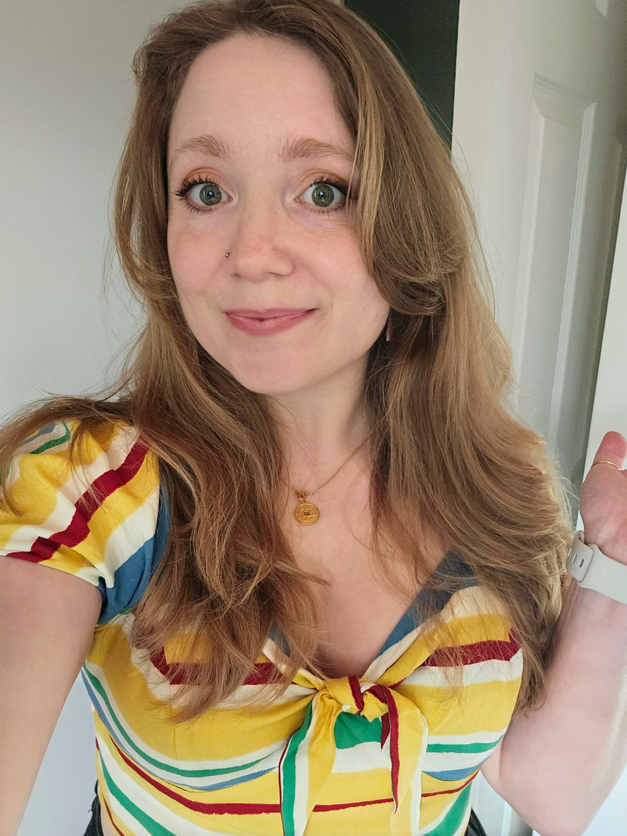 Woman sat near flowers