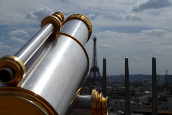 Telescope overlooking the Eiffel Tower in Paris