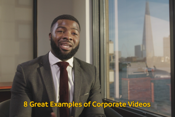 Man dressed smartly giving an interview and on-screen text reading 8 Great Examples of Corporate Videos