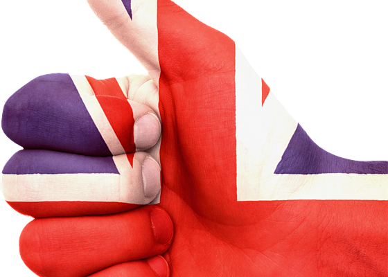 Hand showing the OK sign with UK flag painted on
