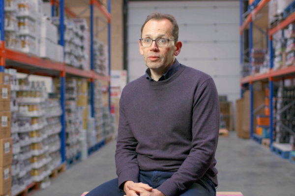 Talking Head interview testimonial man in a warehouse