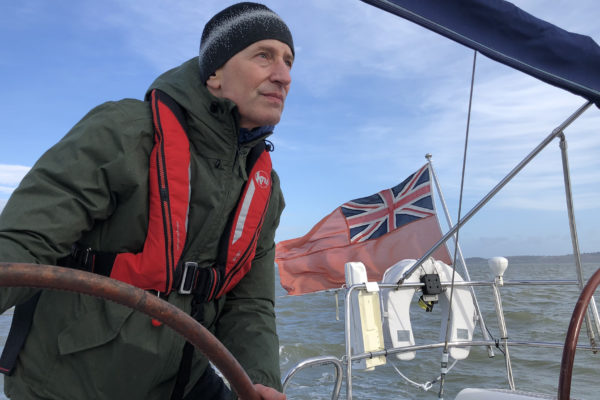 Man sailing english flag