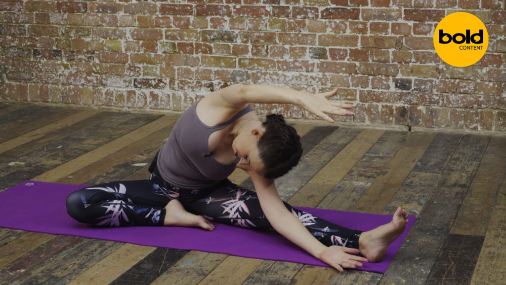 Yoga pose still from fitness video shoot