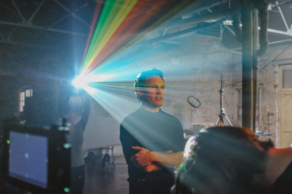 Projector colour spectrum and man on film set