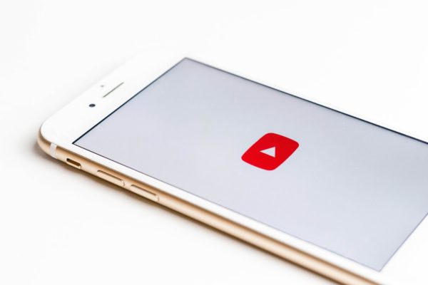 iphone with the youtube app icon