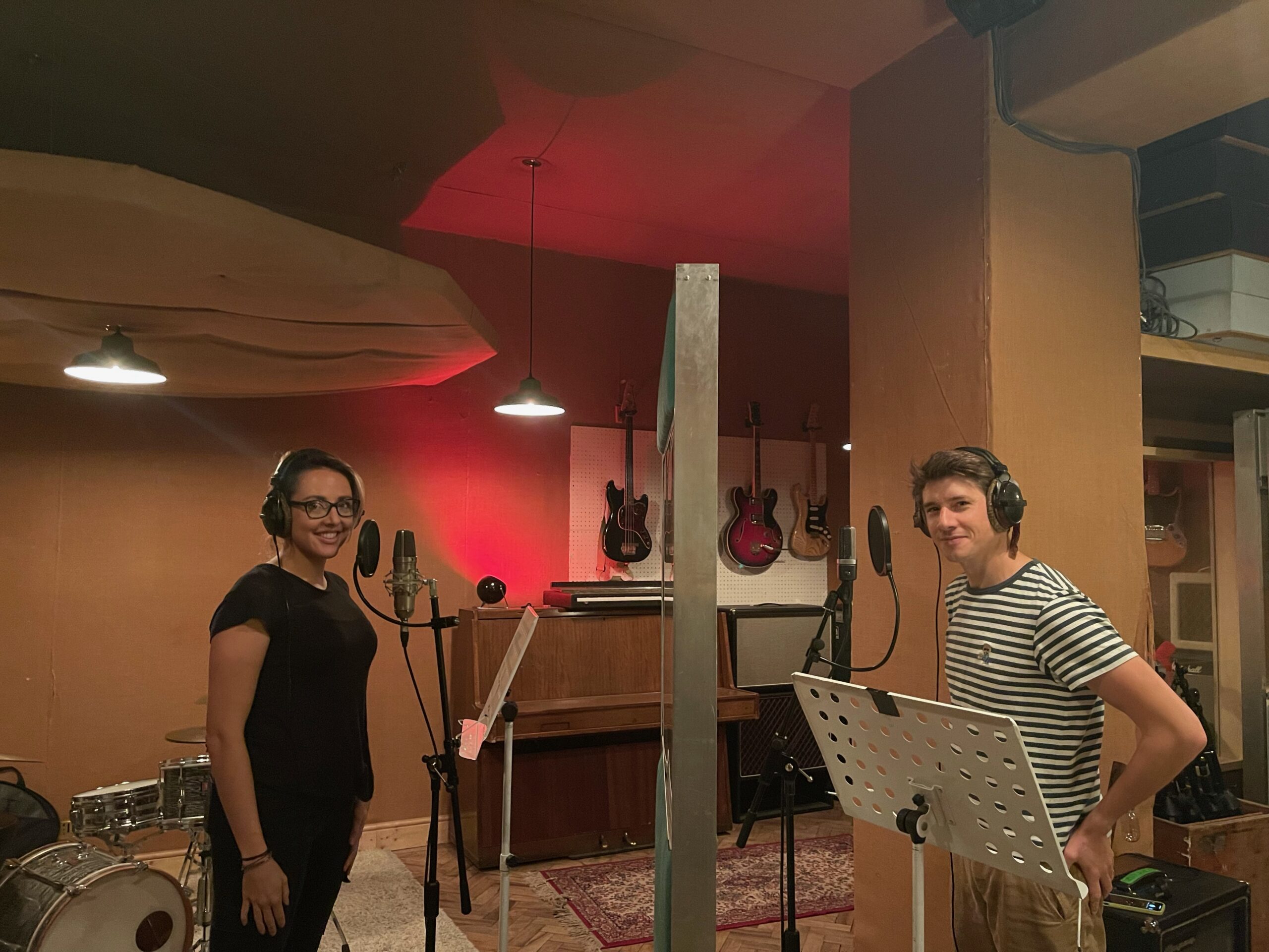 voiceover artists working in a recording studio